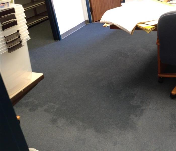 Wet carpet in commercial office